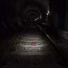 The Red Shoes On The MRT Train Tracks