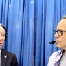 Mayor Rick Meehan gives Nestor the facts about beach and sports tourism in Ocean City at MACo