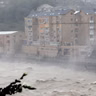 Typhoon Dolphin weakens; heavy rain still looms