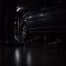 The Grey Face Underneath His Car